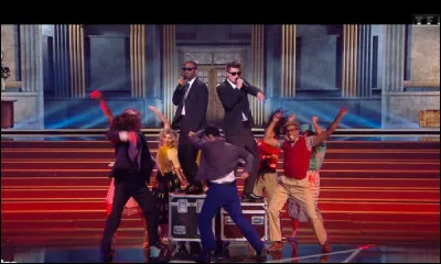 Au quatrième prime : Quelle chanson a-t-il interprétée dans le medley cinéma en duo avec Stanislas ?