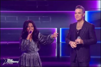 Au septième prime : quelle chanson a-t-elle interprétée en duo avec Robbie Williams ?