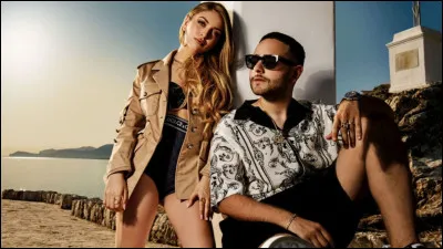 Avec qui a-t-elle chanté les titres "A un passo dalla luna'' et ''Un beso de improviso" ?