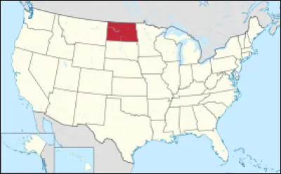 Situé dans la région des Grandes Plaines, il est connu pour son industrie agricole et pétrolière en plein essor. Il offre également des paysages naturels variés, tels que les Badlands, les lacs et les rivières. Quel est le nom de cet État ?