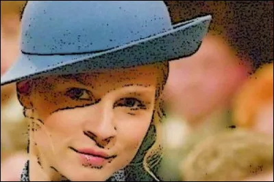 Quelle est la couleur de son chapeau ?