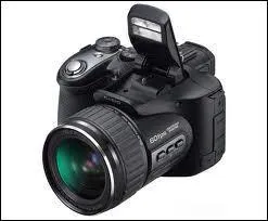 Quand vous arrivez sur l'le des Yoshis, quelqu'un vous prend en photo. Qui est-ce ?