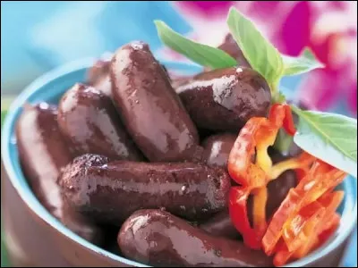 Quel ingrédient différencie le boudin créole du boudin classique ?