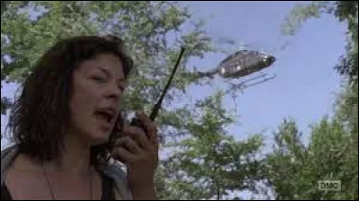 Dans la saison 9, par qui Rick se fait-il emmener en hélicoptère ?