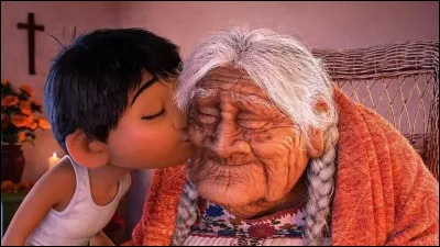 Sur la photo, à qui Miguel fait-il un bisou ?