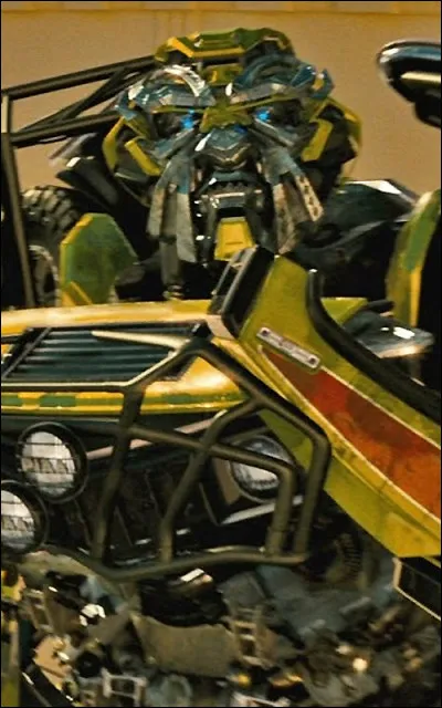 C'est un Autobot spécialiste de la médecine et de la réparation. Il apparaît dans les 4 premiers films Transformers. Qui est-il ?