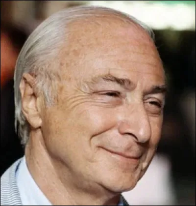 Qui est ce cin&eacute;aste, r&eacute;alisateur du film comique ''Le Coup du parapluie'' ?