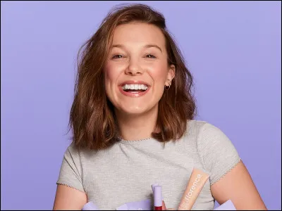 Comment s'appelle la marque de cosmétiques de Millie ?