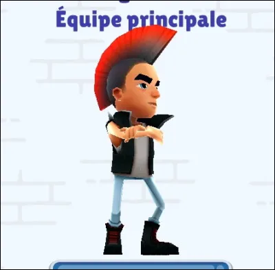 Ce personnage (voir photo) est un garçon au pantalon bleu. Il porte une veste de cuir. Ses cheveux sont noirs puis deviennent rouges. Comment se nomme ce personnage qui fait partie de l'équipe principale ?