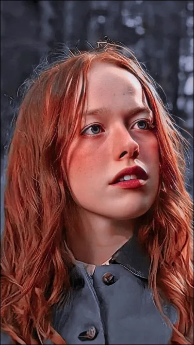 Quelle couleur dit-elle ne pas pouvoir porter &agrave; cause de ses cheveux roux ?