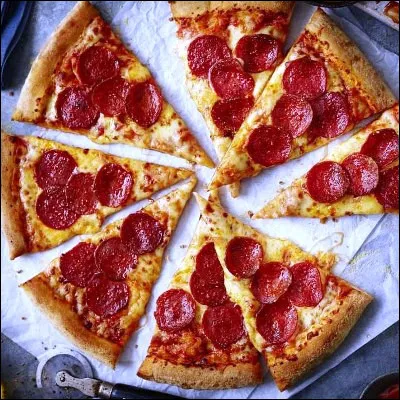 Quel dessin animé américain des années 1980 présente un quatuor de héros amateurs de pizzas ?