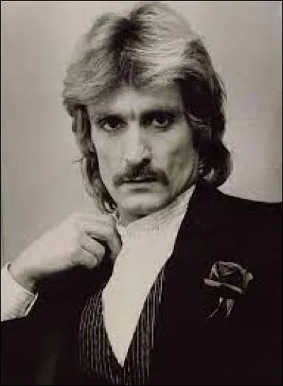 Quelle est la couleur des mots d'après une chanson de Christophe ?