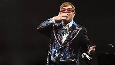 En quelle année son titre "Don't Go Breaking My Heart" est-il sorti ?