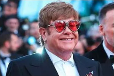 De quel instrument de musique son père jouait-il ?