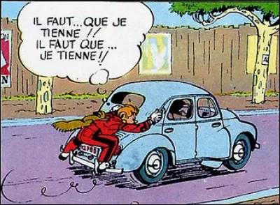 Sur quelle voiture s'est agrippé Spirou ?