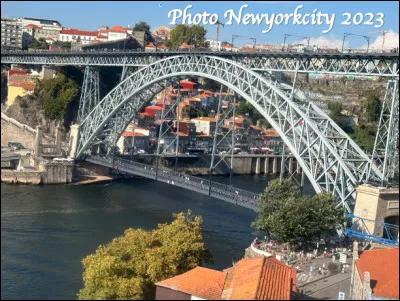 Quel est le nom de ce pont qui enjambe le fleuve Douro et relie Porto à Villa Nova de Gaia, construit en 1886 par un disciple de Gustave Eiffel ?