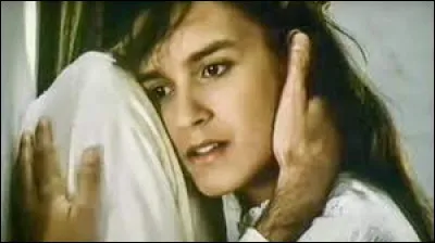 En 1987, avec qui chante-t-il le titre ''Là-bas'' ?