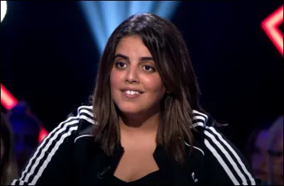 À qui Inès Reg demande-t-elle de mettre des paillettes dans sa vie ?