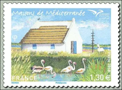 2018 se consacre aux "Maisons de la Méditerranée", avec ici un habitat camarguais traditionnel. Son toit est constitué de faisceaux de roseaux cousus ensemble, que l'on nomme ... (Complétez !)