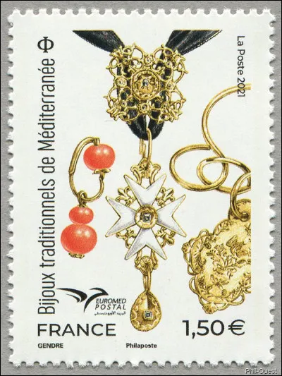 2021 rendait hommage à la joaillerie méditerranéenne, principalement celle du quotidien qui ornait les costumes locaux. Comment se nomme celui (le costume féminin) de la ville d'Arles ?