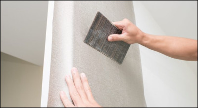 Quelle verbe signifie ''coller de la toile sur un support'' ?