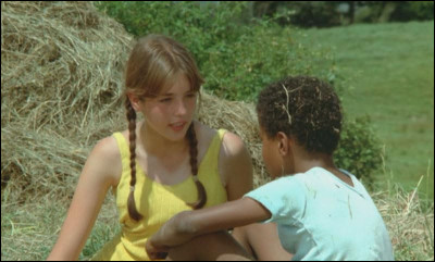 Dans quel film joue-t-elle son tout premier rôle en 1970 ?