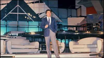 Quel est le nom de l'émission TV qu'il présente en 1986 ?