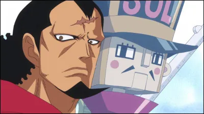 Autrefois un guerrier réputé, il était le chef de l'armée du roi de Dressrosa. Mais, il a été transformé en jouet pendant dix ans par les pouvoirs de Sugar. Il est le père de Rebecca. Qui est-il ?