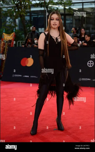 Quelle grande star a écrit sa chanson "Dime Dime", sortie en mars 2022 ?