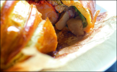 Comment appelle-t-on ce plat gastronomique composé d'une pâte farcie de homard et de foie gras ?