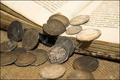 Quel est le nom du roi de Lydie qui a fait fabriquer les premières pièces en argent ?