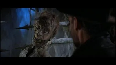 Comment s'appelait l'archologue mort au dbut des aventuriers de l'arche perdue ?