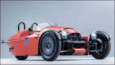 Quelle est cette voiture au style rétro à 3 roues produite en Angleterre depuis 2022 ?