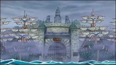 Avec l'aide de qui Luffy s'introduit-il dans la prison "Impel Down" ?