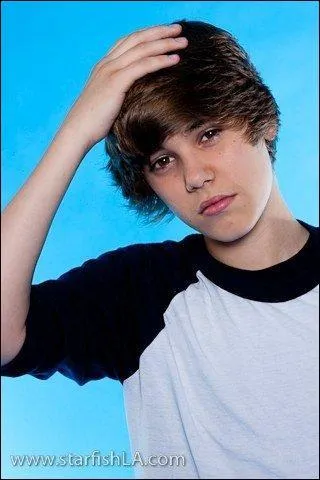 Est-ce que Justin a un tatouage ?