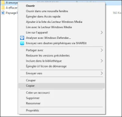 Que dois-je faire pour dupliquer un fichier ?