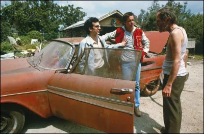 Dans quel film Arnie Cunningham est-il un lycéen complexé qui achète une Plymouth Fury 1958, qui se révèle être une voiture maléfique et jalouse ?