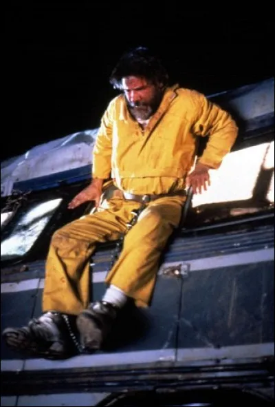 Dans quel film joue-t-il un héros d'homme traqué ?