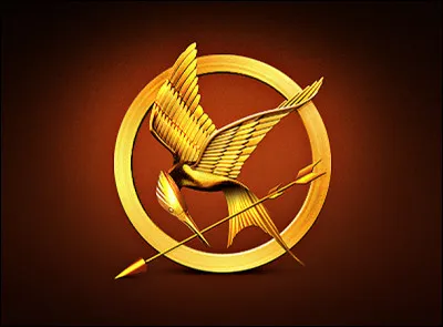 Qui lui a donné sa broche de geai moqueur avant qu'elle parte pour les Jeux ?