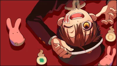 H. Quest-il écrit sur la boucle doreille de Kô dans ''Hanako-kun - Toilet-Bound'' ?