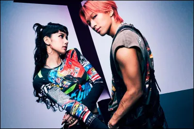 Quand a-t-elle établi une collaboration avec Taeyang du groupe "BigBang" avec le titre "Shoong !" ?