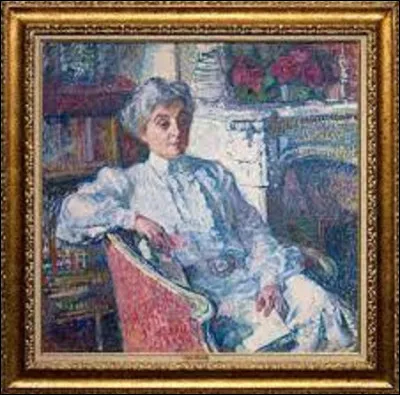 Quel pointilliste a peint ici son épouse assise dans un fauteuil au coin du feu, en 1913 ?
