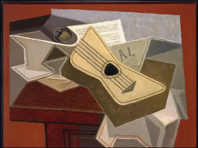 Qui a peint "Guitare et journal" ?