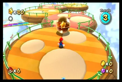 Que contient la boule dans la comète farceuse du Manège Arc-en-ciel ?