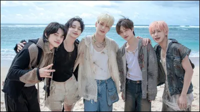 Quel membre de TXT a fait ses débuts en solo en 2024 ?