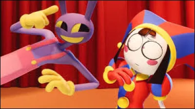 Comment est Caine physiquement ? (le directeur du cirque)