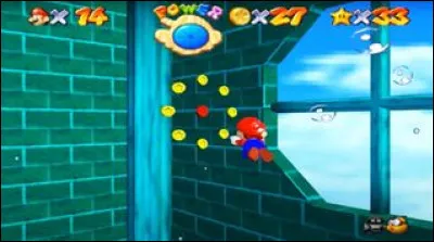 De quel côté se trouve l'aquarium secret lorsque l'on entre dans la salle avec le tableau de la "Baie des pirates" ?