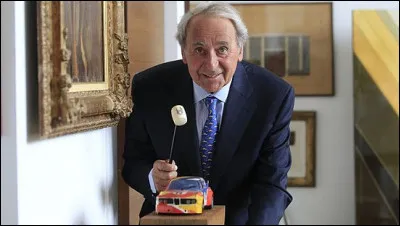 Quel est le premier métier d'Hervé Poulain commissaire priseur et initiateur de l'Art car ?