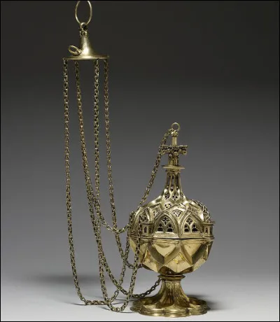 Quel est ce vase lithurgique en E qui sert à brûler de l'encens, symbole de purification ?
