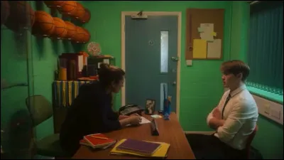 Dans quel livre se trouve la scène de discussion entre le coach et Nick après les avoir surpris dans le cagibi ?